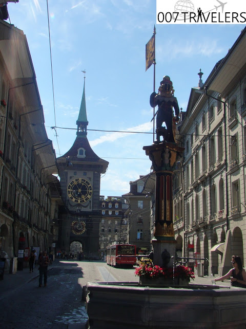 007 Filming location: Zytglogge on background the car window / On Her Majesty’s Secret Service (1969)